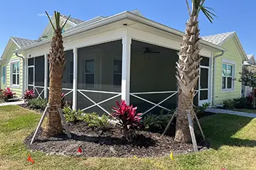 Screen porch under existing roof by East Coast Aluminum